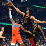 Jarrett Allen #31 of the Cleveland Cavaliers blocks Shai Gilgeous-Alexander #2 of the Oklahoma City Thunder during the first quarter at Rocket Mortgage Fieldhouse on January 22, 2022 in Cleveland, Ohio.