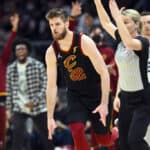 Dean Wade #32 of the Cleveland Cavaliers celebrates after scoring during the third quarter against the Milwaukee Bucks at Rocket Mortgage Fieldhouse on January 26, 2022 in Cleveland, Ohio. The Cavaliers defeated the Bucks 115-99.