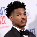 Ochai Agbaji poses for photos on the red carpet during the 2022 NBA Draft at Barclays Center on June 23, 2022 in New York City. NOTE TO USER: User expressly acknowledges and agrees that, by downloading and or using this photograph, User is consenting to the terms and conditions of the Getty Images License Agreement.