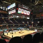 The few fans allowed to be in attendance are reminded of the mask guidelines during a time-out during the third quarter of the game between the Cleveland Cavaliers and the Charlotte Hornets at Rocket Mortgage Fieldhouse on December 23, 2020 in Cleveland, Ohio. The Cavaliers defeated the Hornets 121-114.