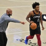 Head coach John-Blair Bickerstaff yells to Collin Sexton #2 of the Cleveland Cavaliers during the first quarter against the Brooklyn Nets at Rocket Mortgage Fieldhouse on January 20, 2021 in Cleveland, Ohio.