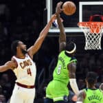 Evan Mobley #4 of the Cleveland Cavaliers fouls Jarred Vanderbilt #8 of the Minnesota Timberwolves during the second half at Rocket Mortgage Fieldhouse on February 28, 2022 in Cleveland, Ohio. The Timberwolves defeated the Cavaliers 127-122.