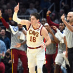 Cedi Osman #16 of the Cleveland Cavaliers celebrates after scoring during the second quarter against the Toronto Raptors at Rocket Mortgage Fieldhouse on March 06, 2022 in Cleveland, Ohio.