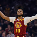 Darius Garland #10 of the Cleveland Cavaliers celebrates during the first half against the Atlanta Hawks at Rocket Mortgage Fieldhouse on April 15, 2022 in Cleveland, Ohio.
