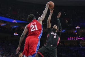 Joel Embiid #21 of the Philadelphia 76ers blocks the shot of Markieff Morris #8 of the Miami Heat in the second half during Game Four of the 2022 NBA Playoffs Eastern Conference Semifinals at the Wells Fargo Center on May 8, 2022 in Philadelphia, Pennsylvania. The 76ers defeated the Heat 116-108. NOTE TO USER: User expressly acknowledges and agrees that, by downloading and or using this photograph, User is consenting to the terms and conditions of the Getty Images License Agreement.