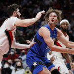 Robin Lopez #33 of the Orlando Magic shoots against Jusuf Nurkic #27 of the Portland Trail Blazers d1h at Moda Center on February 08, 2022 in Portland, Oregon. NOTE TO USER: User expressly acknowledges and agrees that, by downloading and/or using this photograph, User is consenting to the terms and conditions of the Getty Images License Agreement.