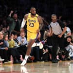 LeBron James #23 of the Los Angeles Lakers runs upcourt after shooting a three point shot during the second half of a game against the Cleveland Cavaliers at Staples Center on January 13, 2020 in Los Angeles, California.