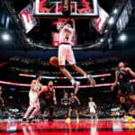 Evan Mobley #4 of the Cleveland Cavaliers goes up for a slam dunk against Scottie Barnes #4 of the Toronto Raptors during the second half of their basketball game at the Scotiabank Arena on November 5, 2021 in Toronto, Ontario, Canada.