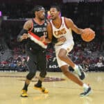 Robert Covington #33 of the Portland Trail Blazers tries to stop Evan Mobley #4 of the Cleveland Cavaliers during the second half at Rocket Mortgage Fieldhouse on November 03, 2021 in Cleveland, Ohio. The Cavaliers defeated the Trail Blazers 107-104.