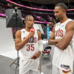 Isaac Okoro #35 interviews Evan Mobley #4 of the Cleveland Cavaliers during Media Day at Rocket Mortgage Fieldhouse on September 26, 2022 in Cleveland, Ohio.