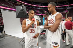 Isaac Okoro #35 interviews Evan Mobley #4 of the Cleveland Cavaliers during Media Day at Rocket Mortgage Fieldhouse on September 26, 2022 in Cleveland, Ohio.