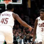 Donovan Mitchell #45 of the Cleveland Cavaliers celebrates with Caris LeVert #3 after scoring against the Boston Celtics qduring the second half at TD Garden on October 28, 2022 in Boston, Massachusetts.