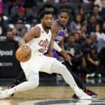 Donovan Mitchell #45 of the Cleveland Cavaliers is guarded by Davion Mitchell #15 of the Sacramento Kings in the first half at Golden 1 Center on November 09, 2022 in Sacramento, California.