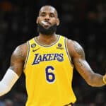 LeBron James #6 of the Los Angeles Lakers shrugs in reaction during the third quarter against the Cleveland Cavaliers at Rocket Mortgage Fieldhouse on December 06, 2022 in Cleveland, Ohio. The Cavaliers defeated the Lakers 115-100.