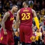 Iman Shumpert #4 and LeBron James #23 of the Cleveland Cavaliers celebrate after James scored during the second half against the Golden State Warriors at Quicken Loans Arena on December 25, 2016 in Cleveland, Ohio. The Cavaliers defeated the Warriors 109-108.