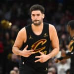 CLEVELAND, OHIO - JANUARY 17: Georges Niang #20 of the Cleveland Cavaliers celebrates after scoring during the second half against the Milwaukee Bucks at Rocket Mortgage Fieldhouse on January 17, 2024 in Cleveland, Ohio. The Cavaliers defeated the Bucks 135-95.