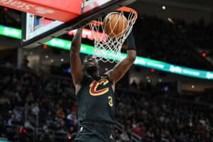 CLEVELAND, OHIO - DECEMBER 21: Caris LeVert #3 of the Cleveland Cavaliers dunks during the second half against the Philadelphia 76ers at Rocket Mortgage Fieldhouse on December 21, 2024 in Cleveland, Ohio. NOTE TO USER: User expressly acknowledges and agrees that, by downloading and or using this photograph, User is consenting to the terms and conditions of the Getty Images License Agreement.