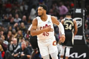 CLEVELAND, OHIO - DECEMBER 20: Donovan Mitchell #45 of the Cleveland Cavaliers celebrates during the second quarter against the Milwaukee Bucks at Rocket Mortgage Fieldhouse on December 20, 2024 in Cleveland, Ohio. NOTE TO USER: User expressly acknowledges and agrees that, by downloading and or using this photograph, User is consenting to the terms and conditions of the Getty Images License Agreement.