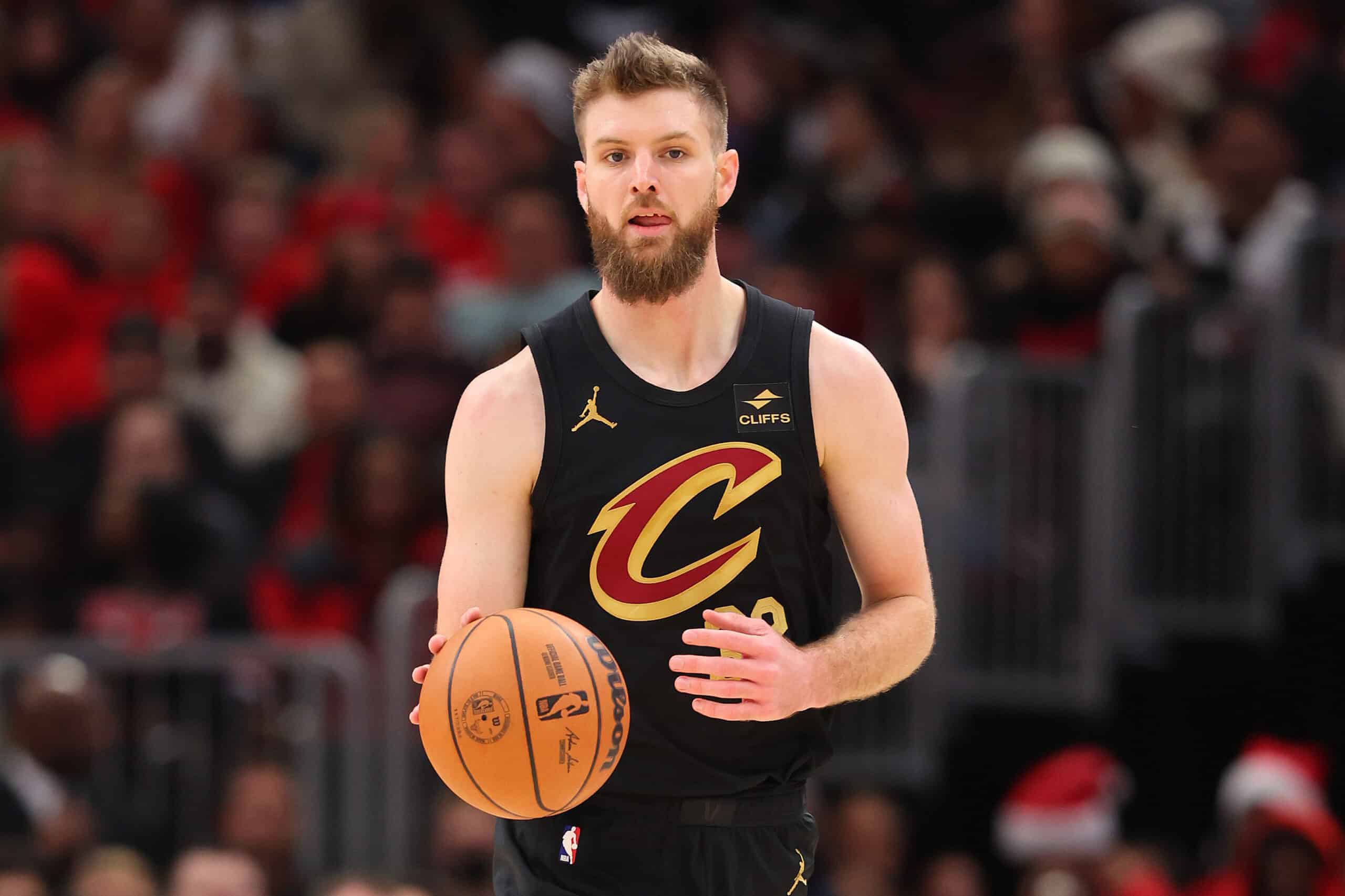 Dean Wade's presence on the court, showcasing his skills and importance to the Cavaliers