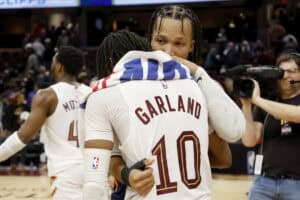 CLEVELAND, OH - APRIL 26: Jalen Brunson #11 of the New York Knicks hugs Darius Garland #10 of the Cleveland Cavaliers after Game Five of the Eastern Conference First Round Playoffs at Rocket Mortgage Fieldhouse on April 26, 2023 in Cleveland, Ohio. New York defeated Cleveland 106-95 to win the series 4-1.