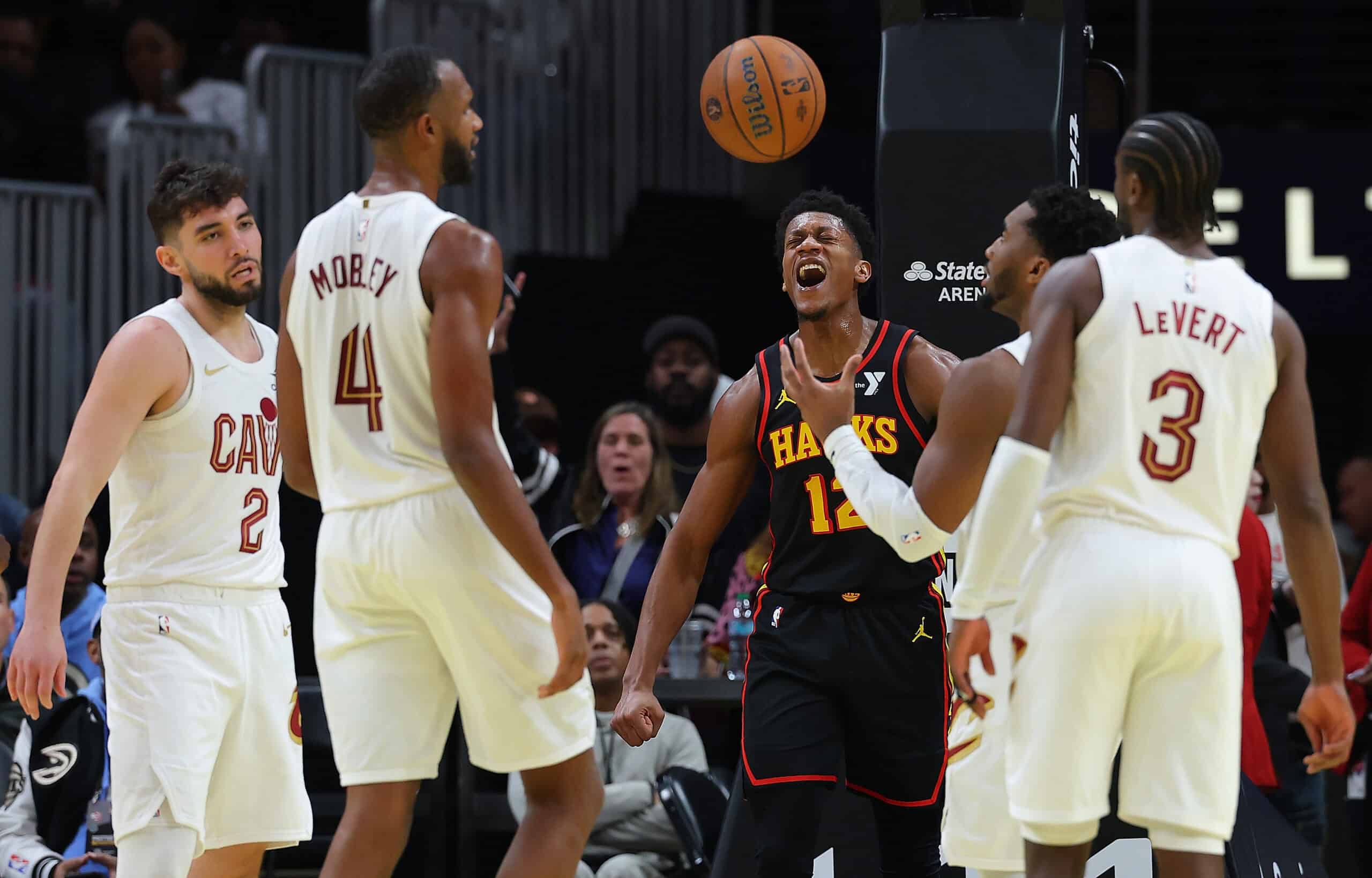 ATLANTA, GEORGIA - NOVEMBER 29: De'Andre Hunter #12 of the Atlanta Hawks reacts after drawing a foul on a basket against the Cleveland Cavaliers during the third quarter of the Emirates NBA Cup game at State Farm Arena on November 29, 2024 in Atlanta, Georgia.