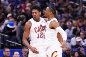ORLANDO, FLORIDA - FEBRUARY 25: De'Andre Hunter #12 celebrates with Isaac Okoro #35 of the Cleveland Cavaliers after scoring against the Orlando Magic during the first quarter at Kia Center on February 25, 2025 in Orlando, Florida.