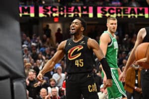 CLEVELAND, OHIO - FEBRUARY 04: Donovan Mitchell #45 of the Cleveland Cavaliers reacts during the fourth quarter against the Boston Celtics at Rocket Mortgage Fieldhouse on February 04, 2025 in Cleveland, Ohio. The Celtics defeated the Cavaliers 112-105.