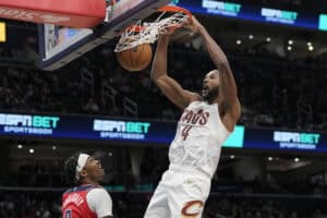 WASHINGTON, DC - FEBRUARY 07: Evan Mobley #4 of the Cleveland Cavaliers dunks against Bilal Coulibaly #0 of the Washington Wizards during the first half at Capital One Arena on February 07, 2025 in Washington, DC.