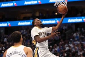 DALLAS, TEXAS - NOVEMBER 19: Javonte Green #4 of the New Orleans Pelicans makes a move to the basket during the second half of an Emirates NBA Cup game against the Dallas Mavericks at American Airlines Center on November 19, 2024 in Dallas, Texas.
