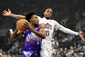 SALT LAKE CITY, UTAH - MARCH 23: Collin Sexton #2 of the Utah Jazz drives into Darius Garland #10 of the Cleveland Cavaliers during the second half of a game at Delta Center on March 23, 2025 in Salt Lake City, Utah. NOTE TO USER: User expressly acknowledges and agrees that, by downloading and or using this photograph, User is consenting to the terms and conditions of the Getty Images License Agreement.