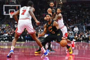 CLEVELAND, OHIO - NOVEMBER 15: Jalen Smith #7 of the Chicago Bulls guards Donovan Mitchell #45 of the Cleveland Cavaliers during the second quarter of the Emirates NBA Cup at Rocket Mortgage Fieldhouse on November 15, 2024 in Cleveland, Ohio.
