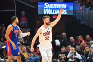 CLEVELAND, OHIO - OCTOBER 25: Dean Wade #32 of the Cleveland Cavaliers celebrates after scoring during the second quarter against the Detroit Pistons at Rocket Mortgage Fieldhouse on October 25, 2024 in Cleveland, Ohio.