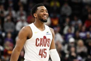 SALT LAKE CITY, UTAH - MARCH 23: Donovan Mitchell #45 of the Cleveland Cavaliers looks on during the first half of a game against the Utah Jazz at Delta Center on March 23, 2025 in Salt Lake City, Utah.