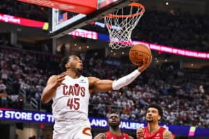 CLEVELAND, OHIO - APRIL 20: Donovan Mitchell #45 of the Cleveland Cavaliers lays up a shot during the third quarter against the Miami Heat of game one of the first round of the Eastern Conference Playoffs at Rocket Arena on April 20, 2025 in Cleveland, Ohio. The Cavaliers defeated the Heat 121-100.