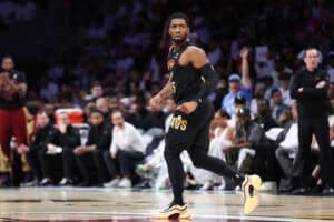 MIAMI, FLORIDA - APRIL 28: Donovan Mitchell #45 of the Cleveland Cavaliers reacts against the Miami Heat during the first quarter in Game Four of the Eastern Conference First Round NBA Playoffs at Kaseya Center on April 28, 2025 in Miami, Florida.