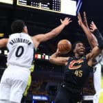 INDIANAPOLIS, INDIANA - MAY 09: Donovan Mitchell #45 of the Cleveland Cavaliers takes a shot against Tyrese Haliburton #0 and Myles Turner #33 of the Indiana Pacers during the first quarter of game three of the Eastern Conference Semifinals at Gainbridge Fieldhouse on May 09, 2025 in Indianapolis, Indiana.