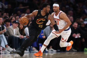 NEW YORK, NEW YORK - MAY 19: Donovan Mitchell #45 of the Cleveland Cavaliers drives around Josh Hart #3 of the New York Knicks during the third quarter in Game One of the NBA Eastern Conference Finals at Madison Square Garden on May 19, 2026 in New York City. NOTE TO USER: User expressly acknowledges and agrees that, by downloading and or using this photograph, User is consenting to the terms and conditions of the Getty Images License Agreement.